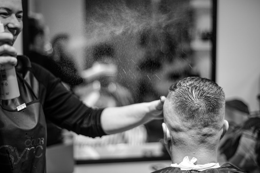 Barber cutting a client's hair