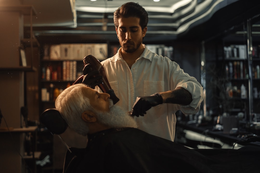 Barber giving a client a haircut