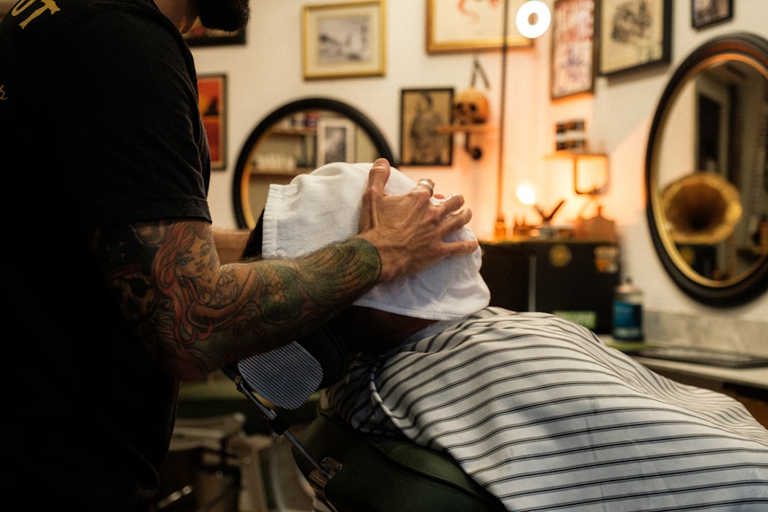 Barber cutting a client's hair